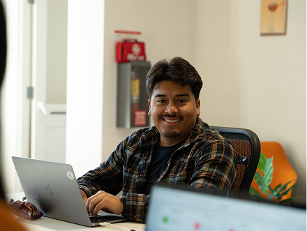 Students with a laptop